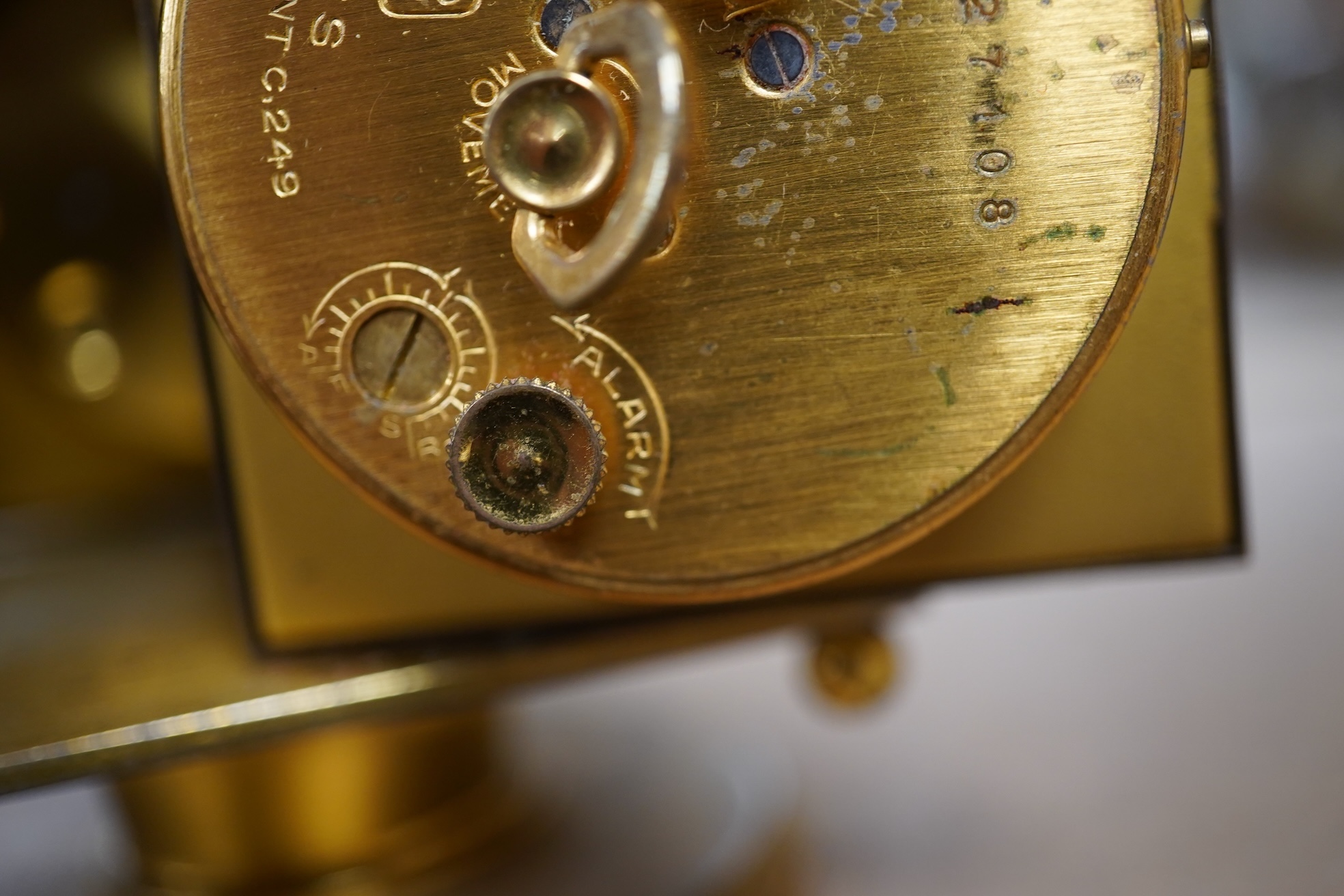 An Imhof brass combination clock, hydrometer, barometer and thermometer, 12cm high. Condition - fair